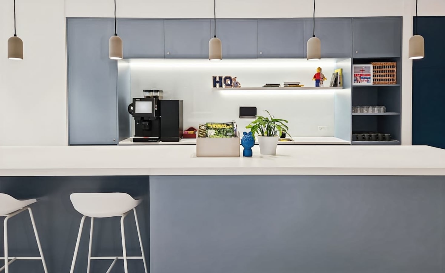 Stylish coworking space on King's Road with modern kitchen and bar seating.