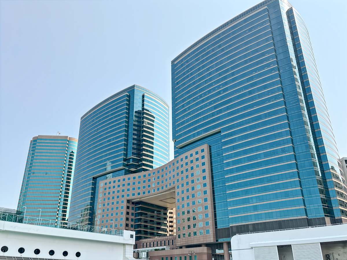 Modern coworking space in a sleek Canton Road high-rise for dynamic professionals.