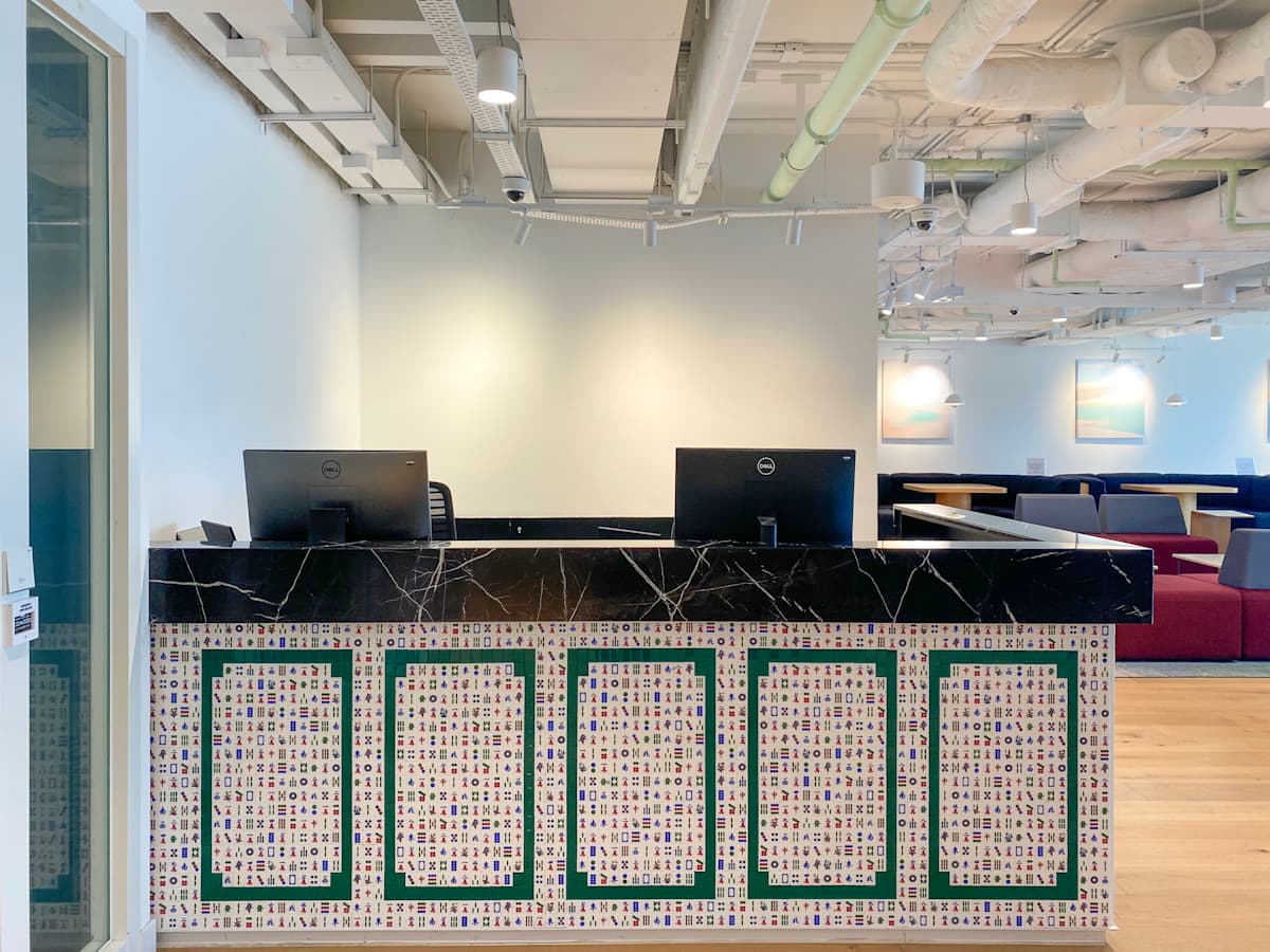 Welcoming reception area with modern design, ideal for dynamic coworking on Canton Road.