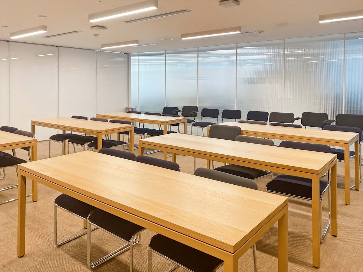 Spacious coworking area with ample seating and natural light on Canton Road. Ideal for collaboration.