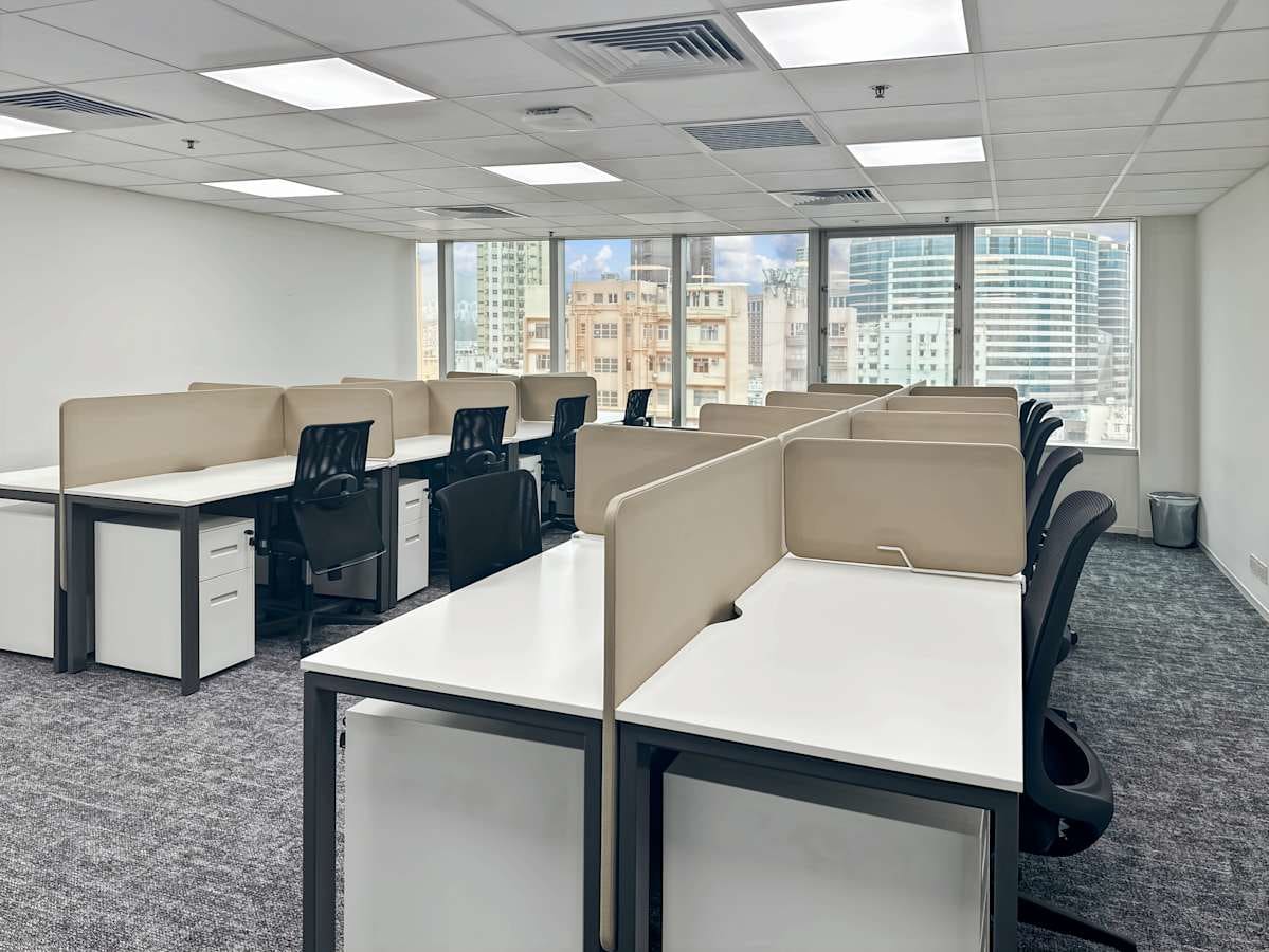 Bright, open coworking space with modern desks and city views on Nathan Road. Ideal for teams.