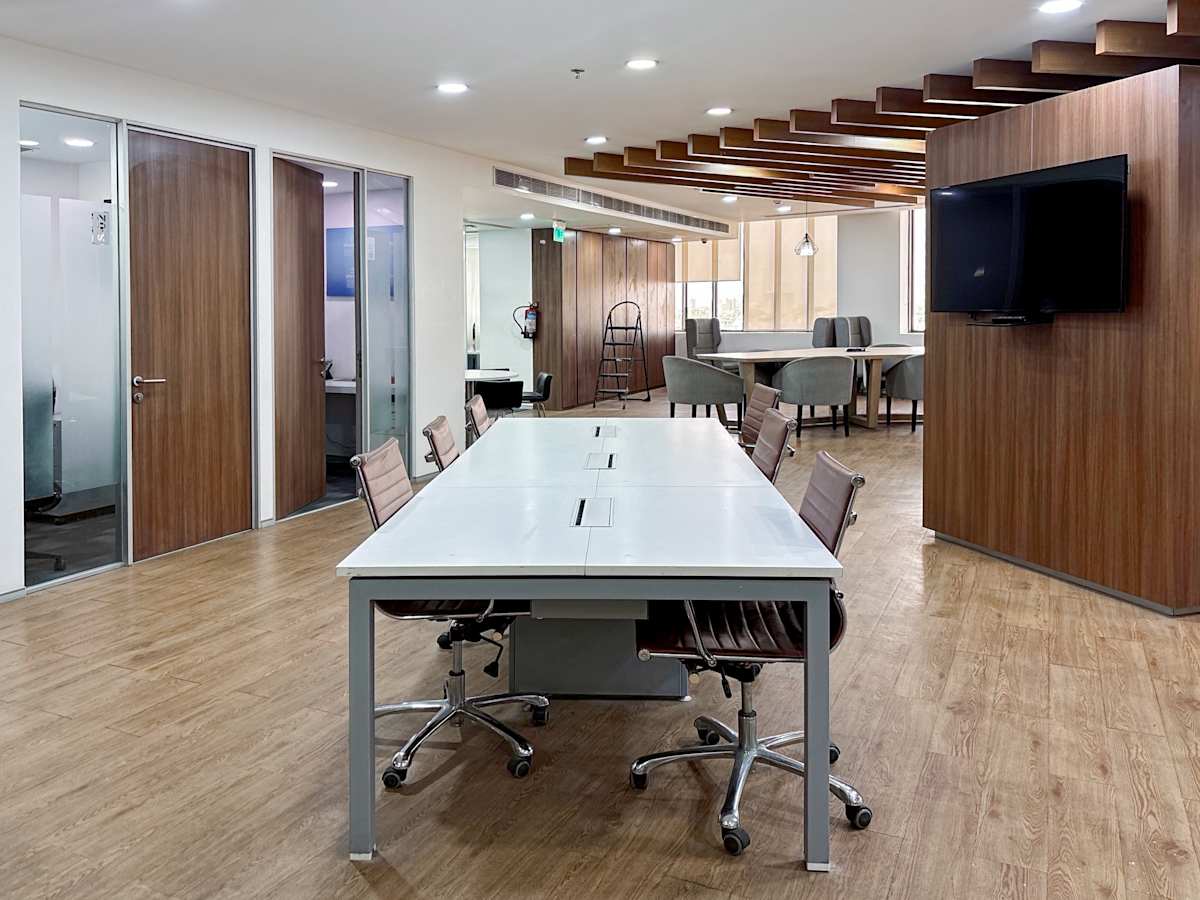 Modern coworking space in Sale Shop, Uttar Pradesh, with sleek desks and collaborative areas.