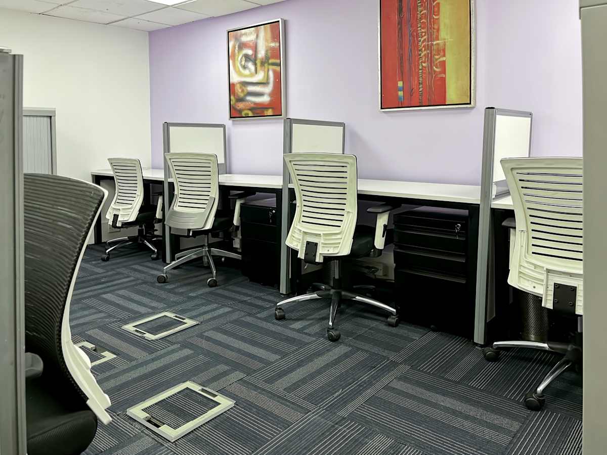 Modern coworking space with sleek workstations and ergonomic chairs in Gurgaon. Ideal for productivity.