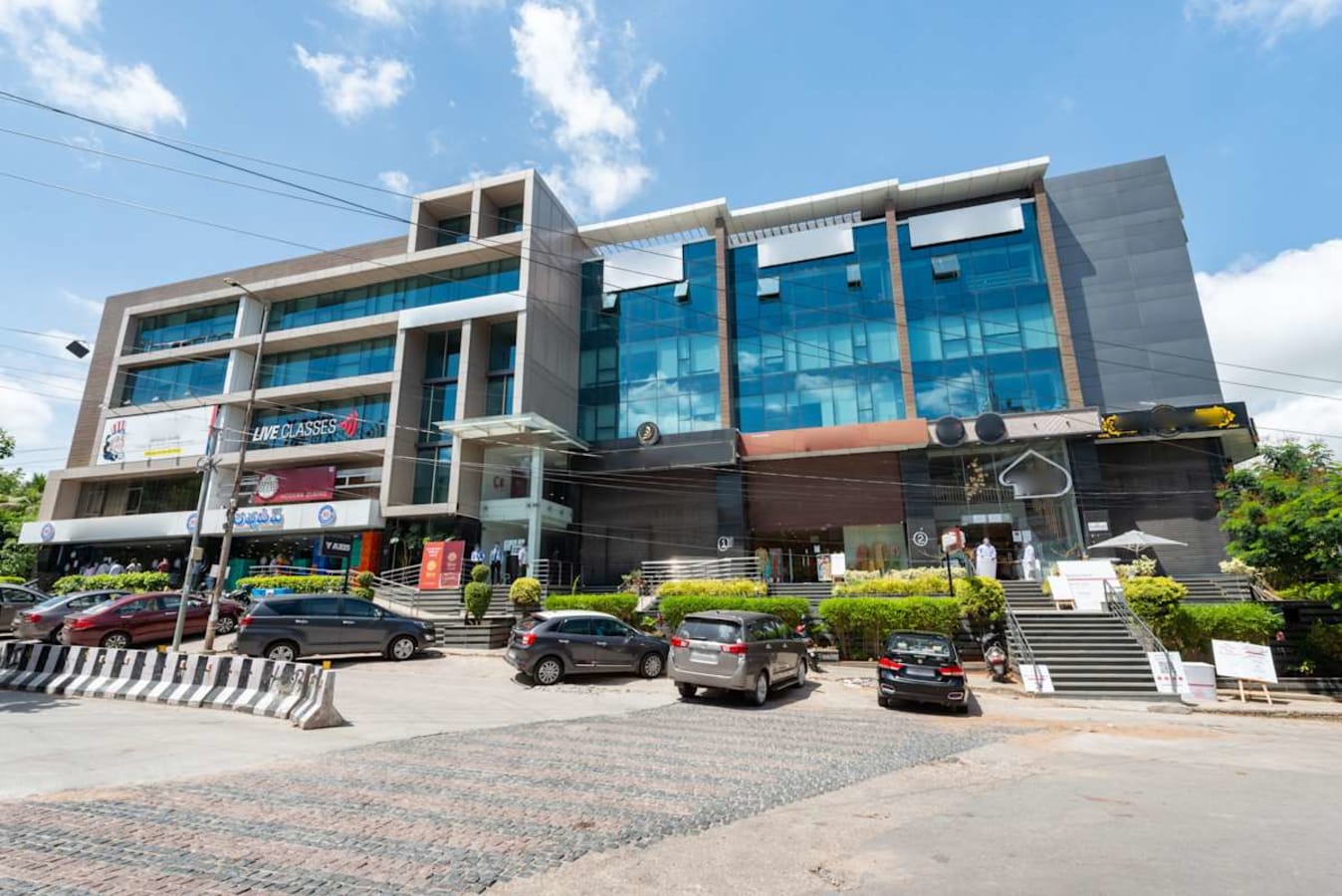 Modern coworking space with ample parking in Telangana's prime location. Ideal for flexible work.