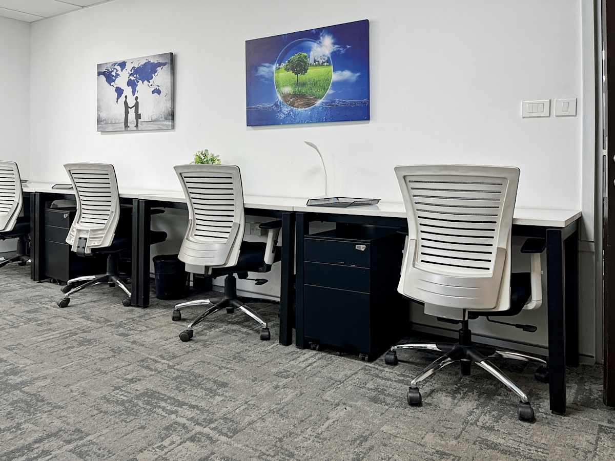 Modern coworking space in Gurugram with ergonomic chairs and ample desk space.