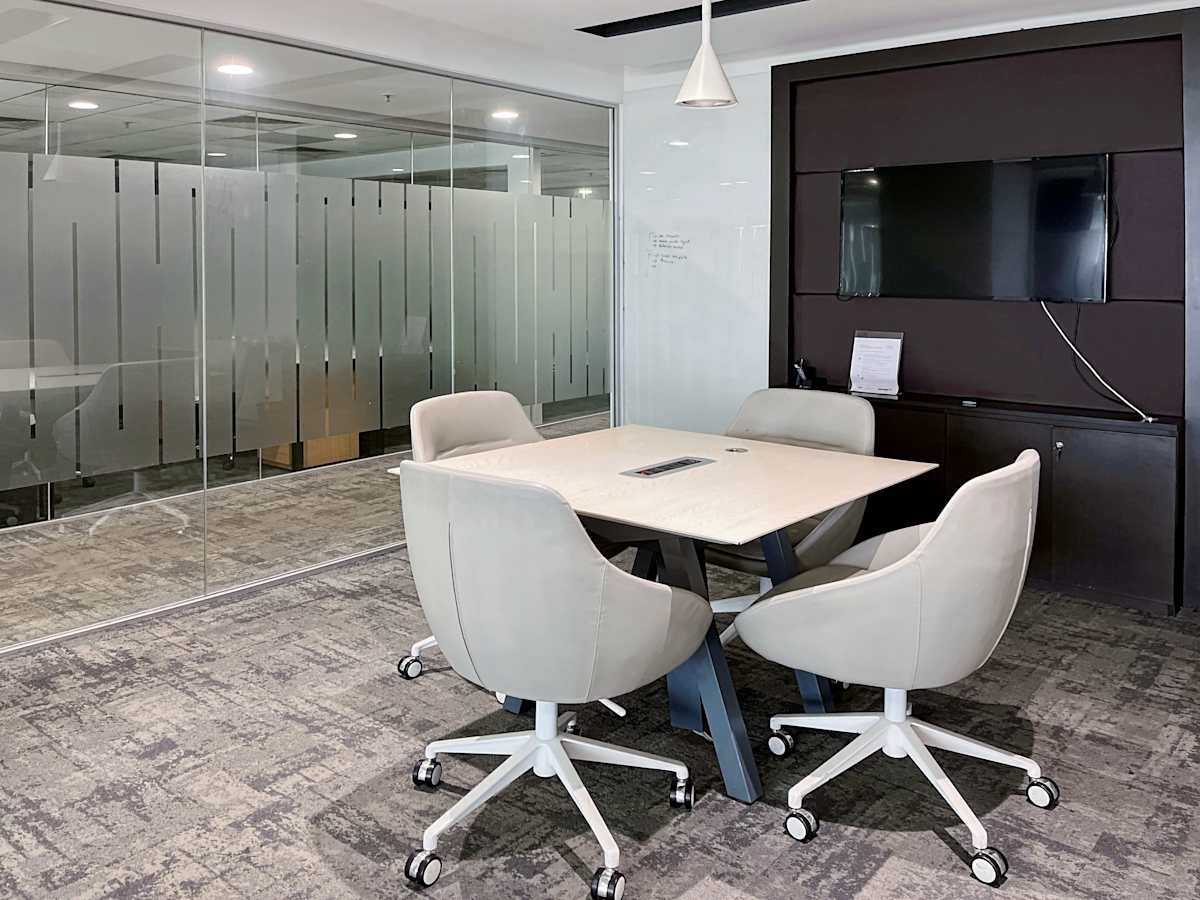 Modern coworking space in Gurugram with sleek furniture and a versatile, collaborative setup.