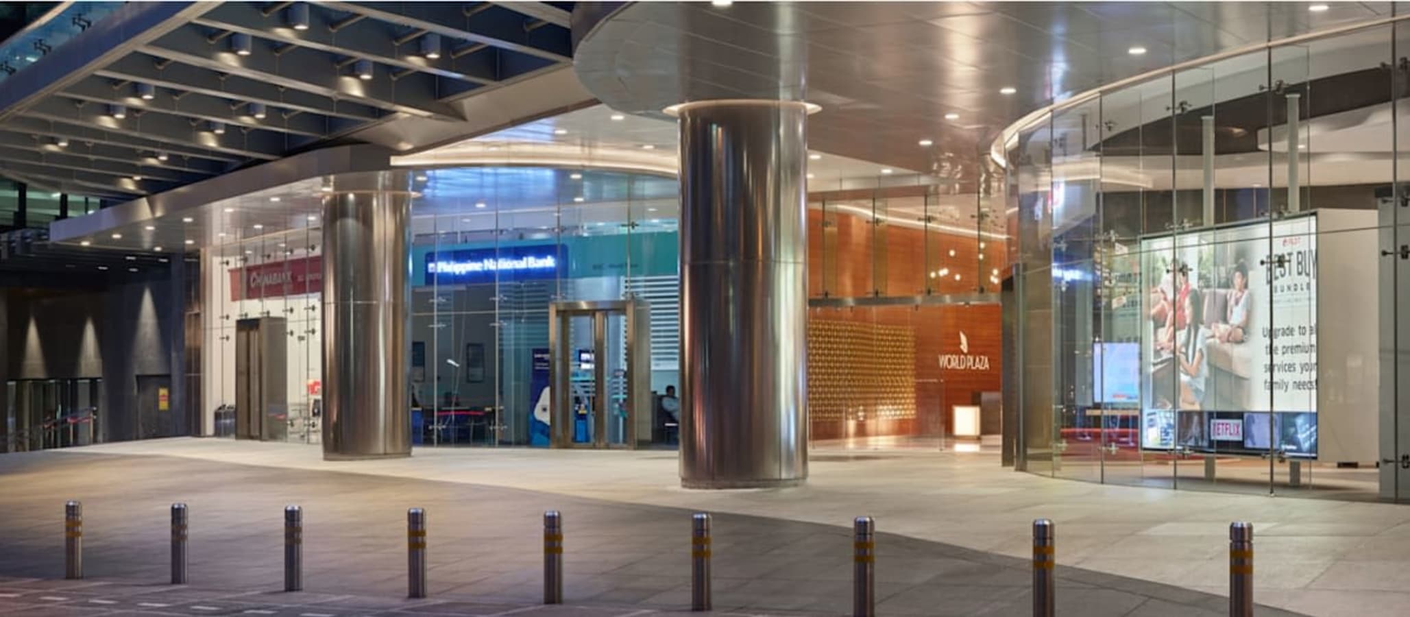 Modern coworking space on 5th Avenue, Metro Manila, features sleek design and vibrant entryway.