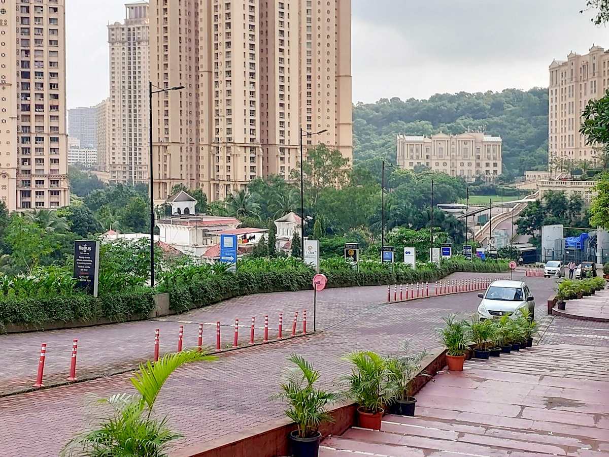 Lush surroundings greet you at this Mumbai coworking space, offering a serene and inspiring location.