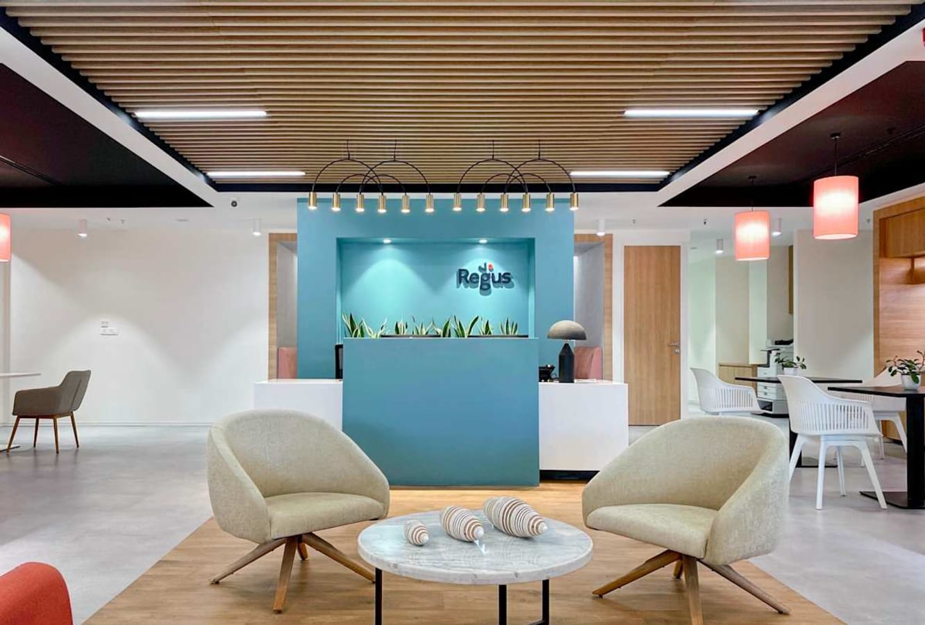 Modern coworking space with stylish seating and ambient lighting in Turbhe Midc Road, Maharashtra.