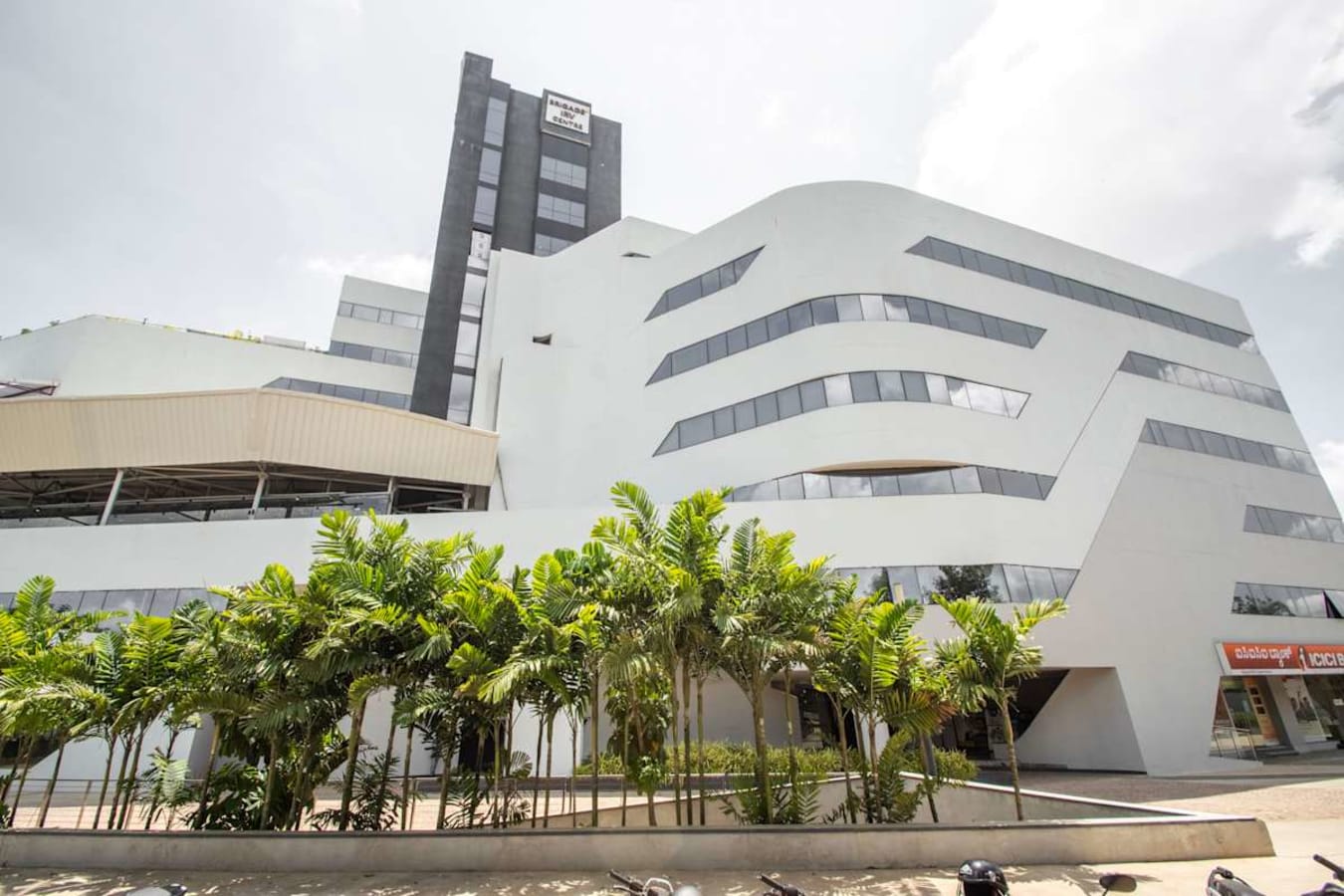 Modern coworking space on Nallurhalli Road with striking architecture and lush landscaping.