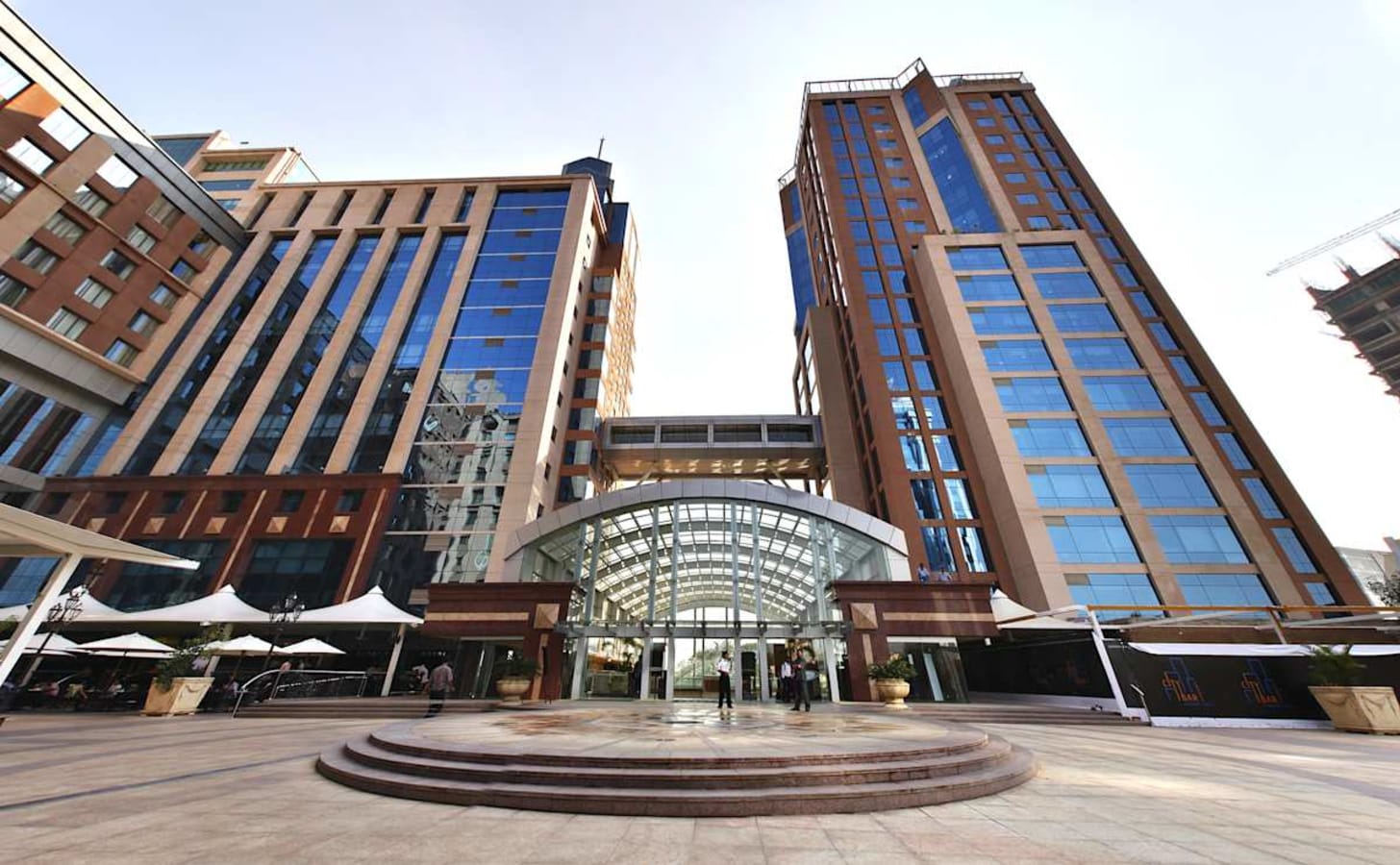 Flexible coworking space in a modern, high-rise building on Vittal Mallya Road. Ideal for professionals.