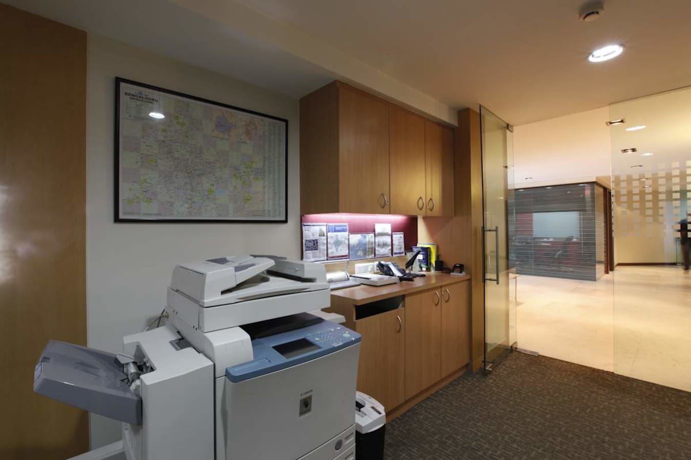 Modern workspace with copier and meeting room access, ideal for flexible coworking needs.