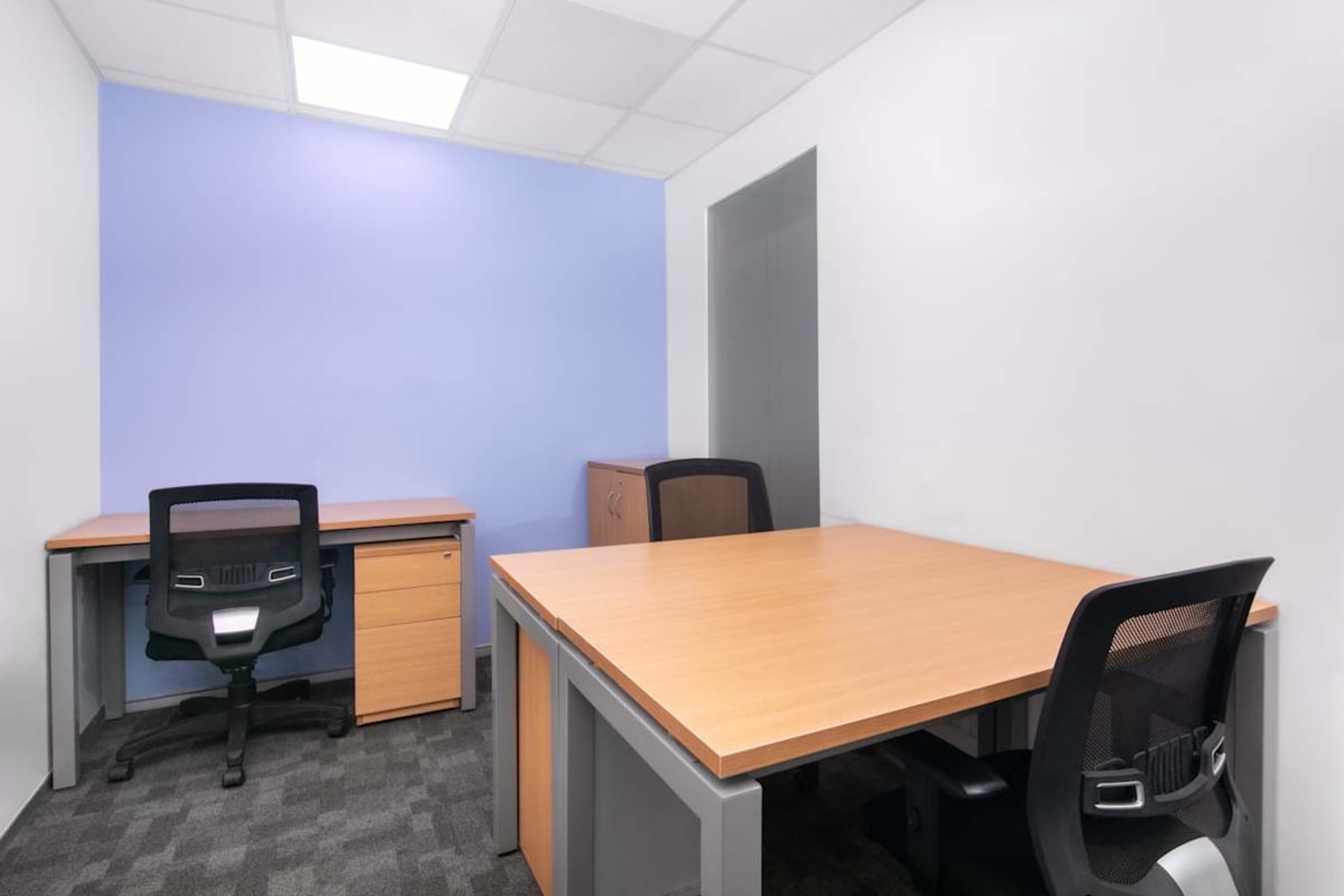 Modern, well-lit coworking space with ergonomic chairs and sleek desks on Camac Street.