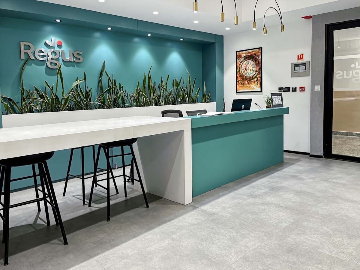 Modern coworking space with sleek desks, vibrant decor, and a welcoming atmosphere in Gurugram.