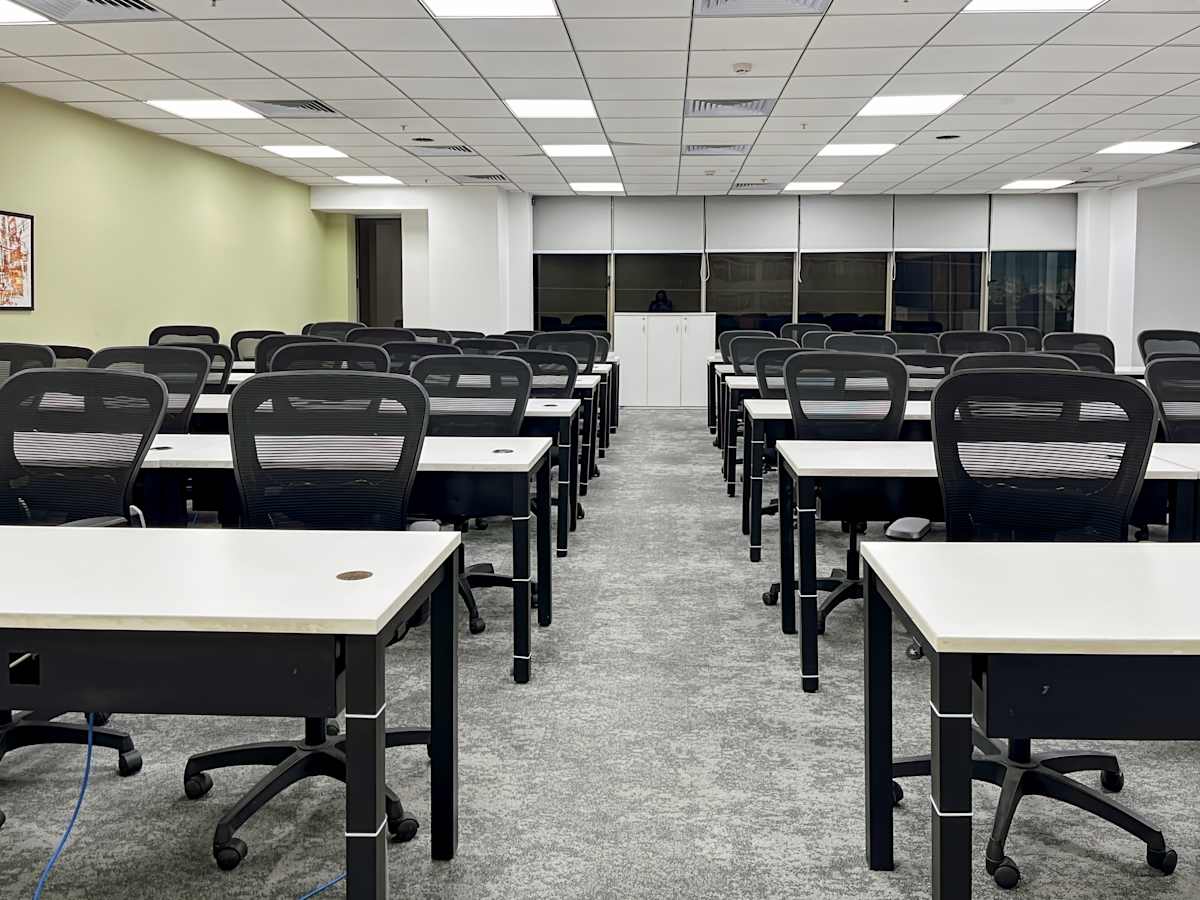 Modern coworking space with ergonomic chairs and spacious desks, ideal for productivity in Gurugram.
