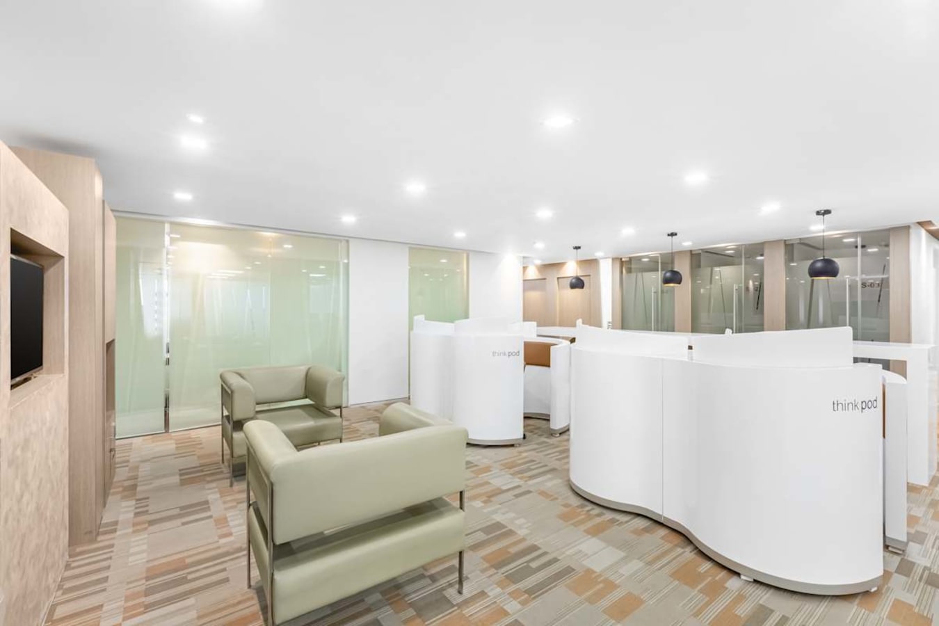 Modern coworking space in South Phase with sleek design, think pods, and ample seating.