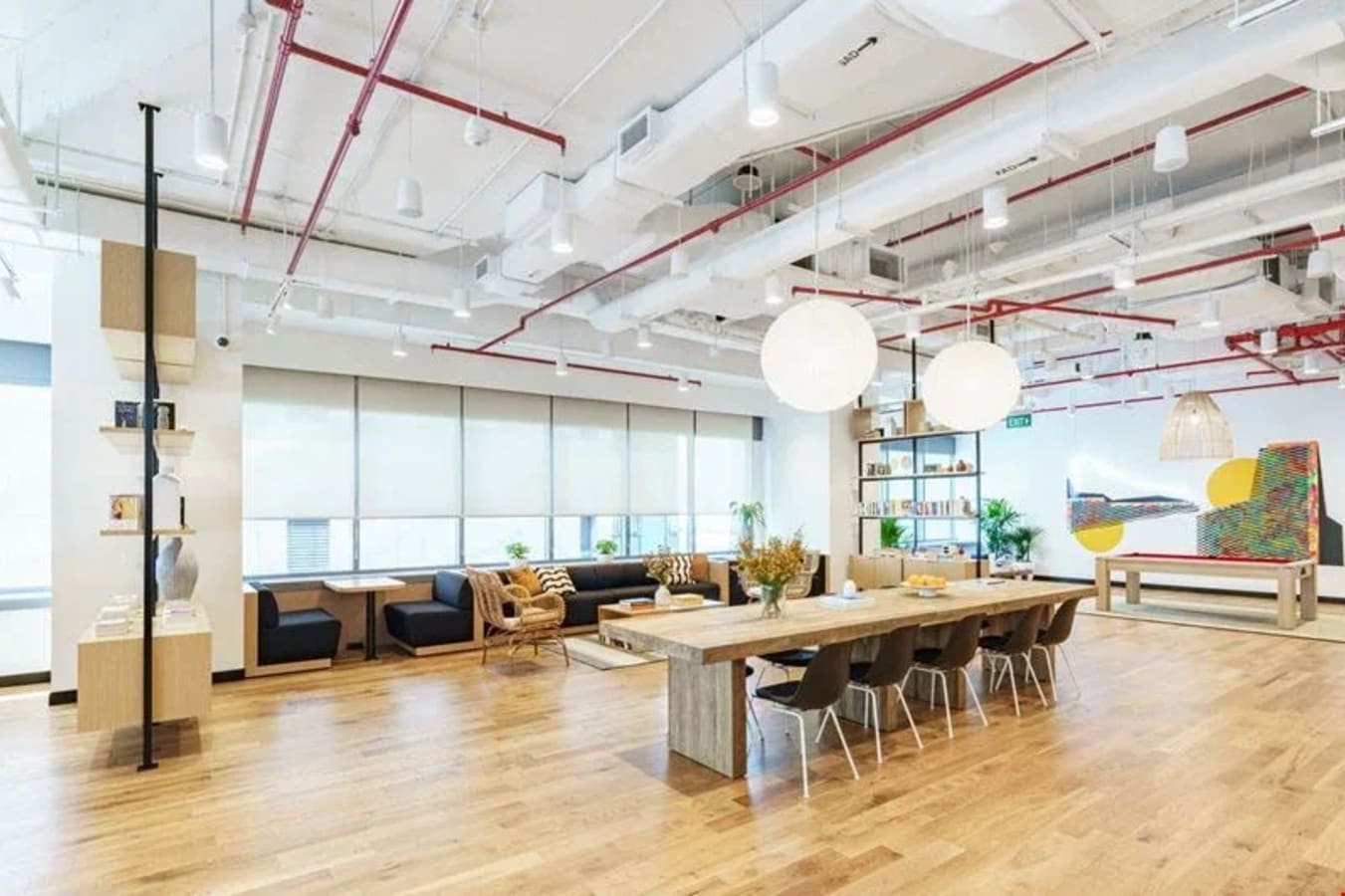 Bright, open coworking space with modern furnishings and ample natural light on Battery Road.