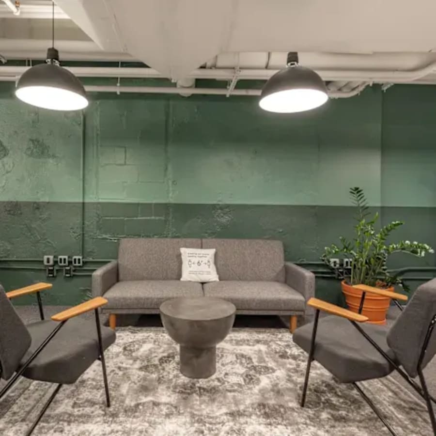 Cozy coworking lounge with modern seating and ambient lighting in Western Bicutan.