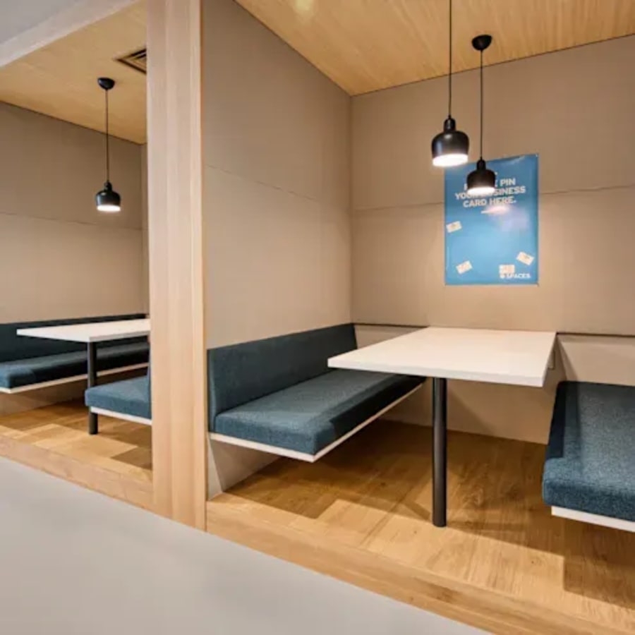 Cozy booth seating in a modern Makati coworking space, perfect for collaborative work.