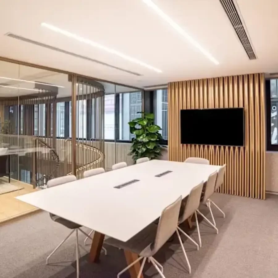 Modern conference room with sleek design, ample seating, and large windows in Taguig coworking space.