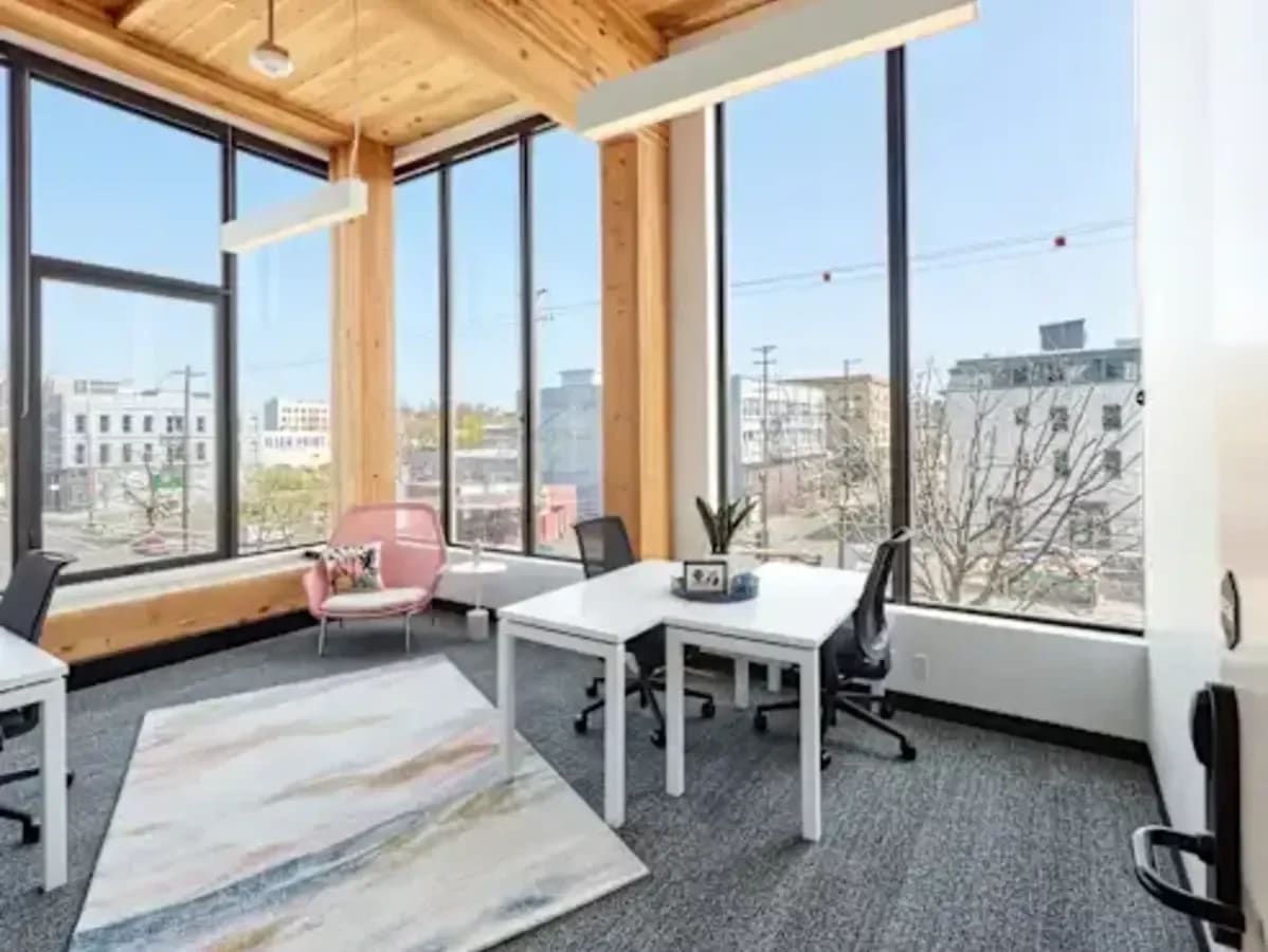 Bright, modern coworking space with large windows and tasteful furnishings in Taguig.