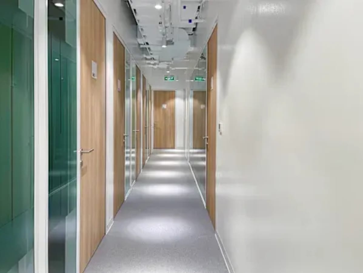 Modern coworking space with sleek corridors and private offices on Gen. Malvar Street, Metro Manila.
