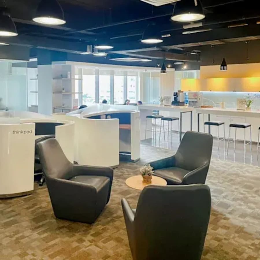 Modern coworking space in Cebu with stylish seating and natural light for collaboration.