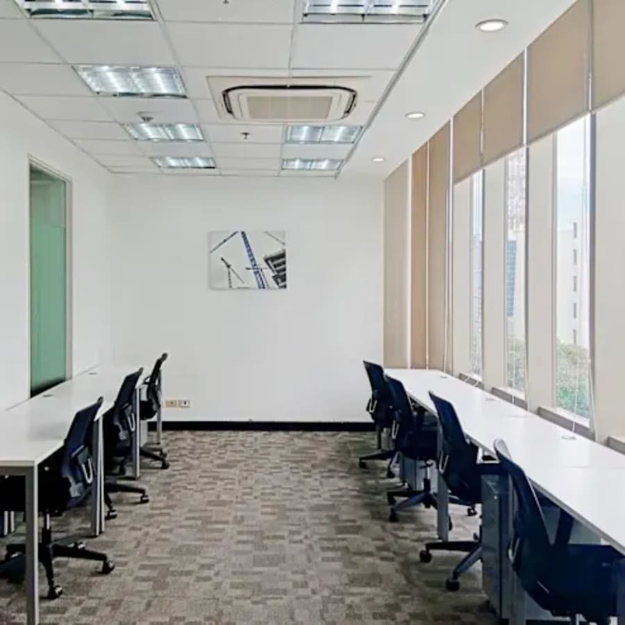 Bright, modern coworking space in Cebu with ample natural light and ergonomic seating.