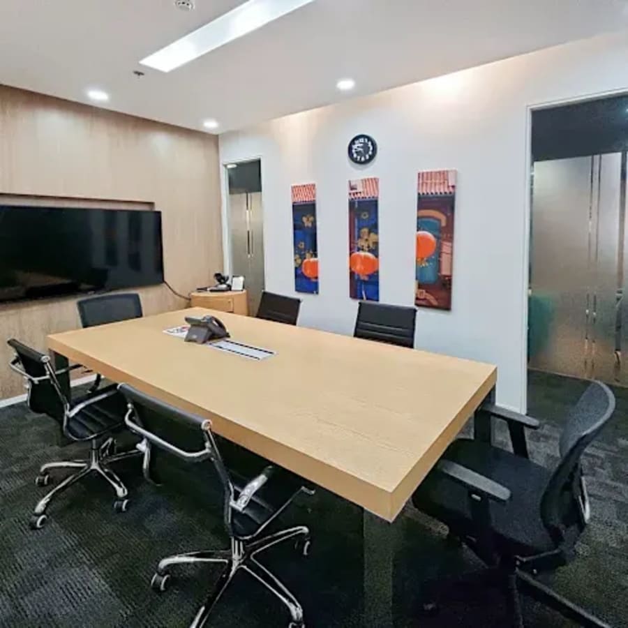 Modern meeting room in Mabalacat coworking space with sleek furnishings and ample lighting.