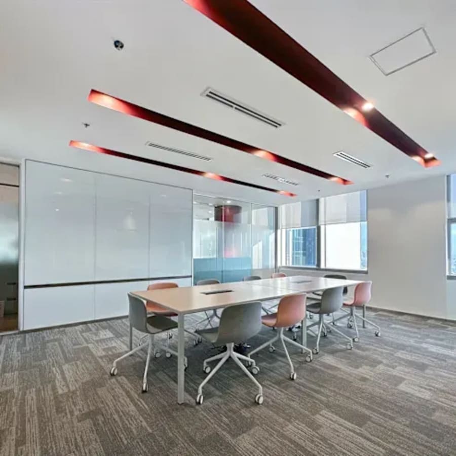 Bright coworking area with modern furniture on Ayala Avenue. Perfect for collaboration.