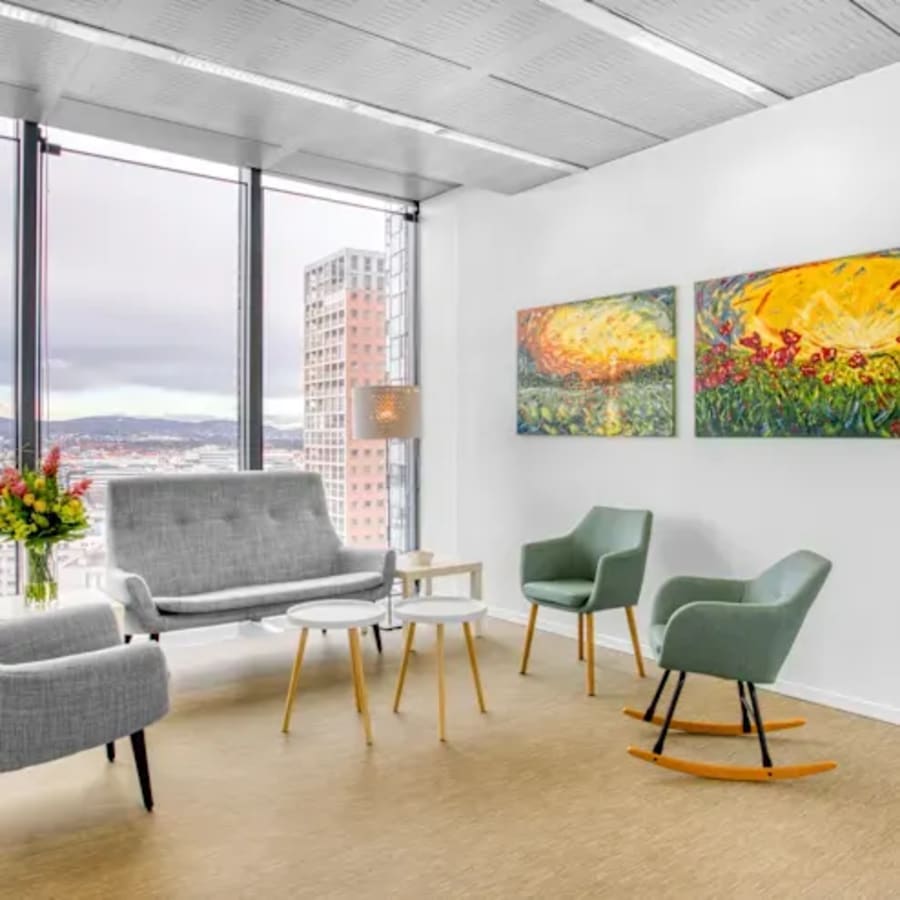 Bright, modern coworking space with city views and stylish seating in Hyderabad.