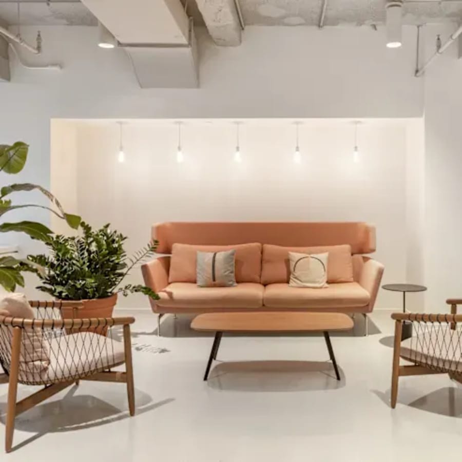 Modern coworking lounge in Chennai with stylish seating and warm lighting. Perfect for collaboration.