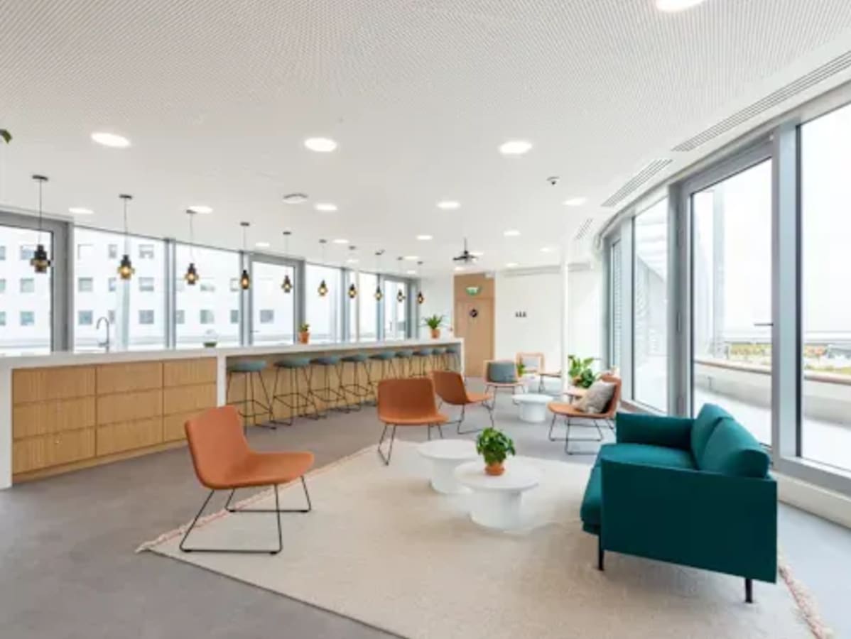Bright coworking space with stylish seating, natural light, and a welcoming atmosphere on GS Road.