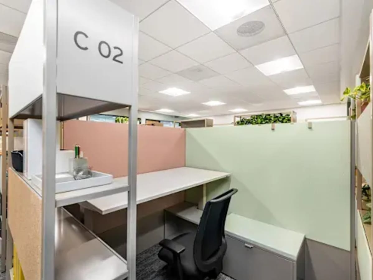 Modern coworking cubicle in Amritsar with bright lighting and cozy privacy, ideal for productivity.