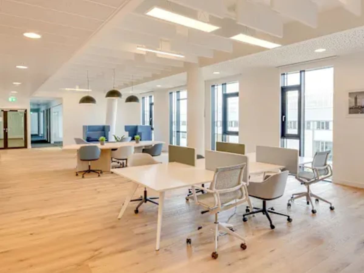 Bright, modern coworking space with open desks and natural light in Hyderabad.