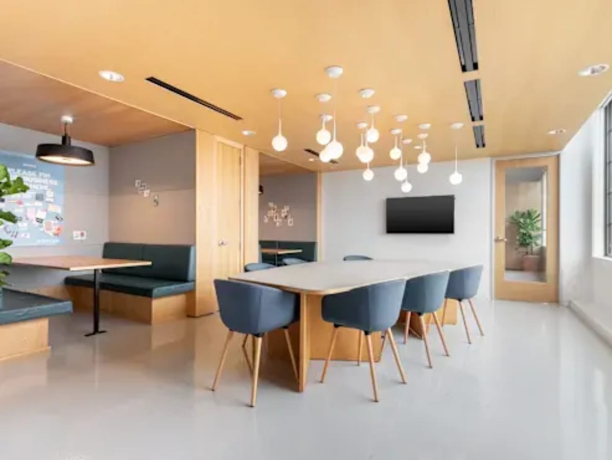 Modern coworking space in Kondapur with sleek seating and abundant natural light.