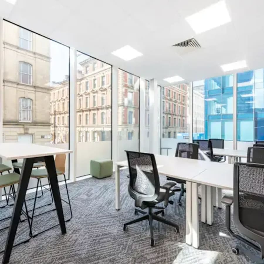 Bright, modern coworking space with large windows and ergonomic furnishings on White Field Road.
