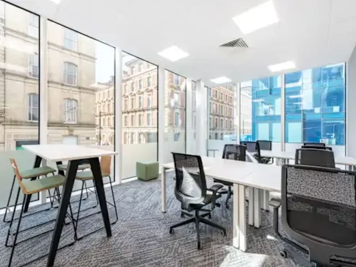 Bright coworking space in Circle, Karnataka, featuring modern furnishings and ample natural light.