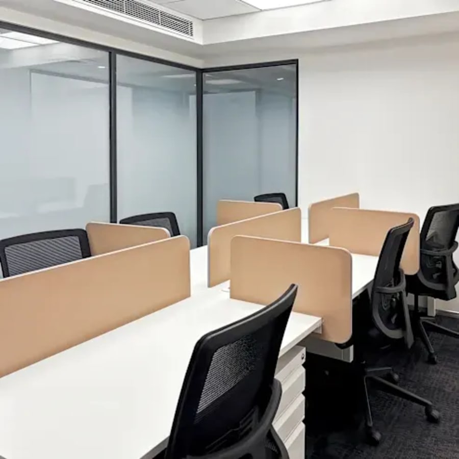 Modern coworking space with sleek cubicles and ergonomic chairs in Chandigarh's Sector 26.