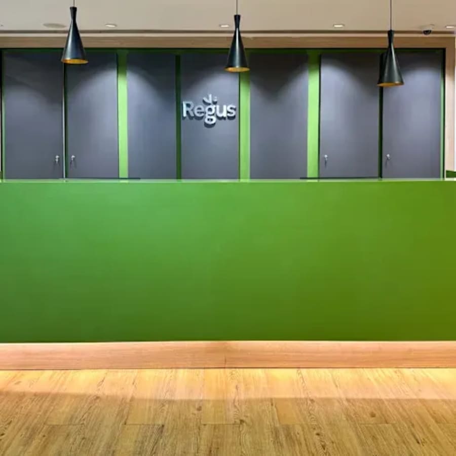 Modern coworking space with vibrant interiors and sleek lighting in Lucknow.