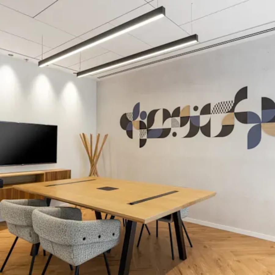 Modern coworking space with stylish decor and cozy seating on Neco Garden Road.