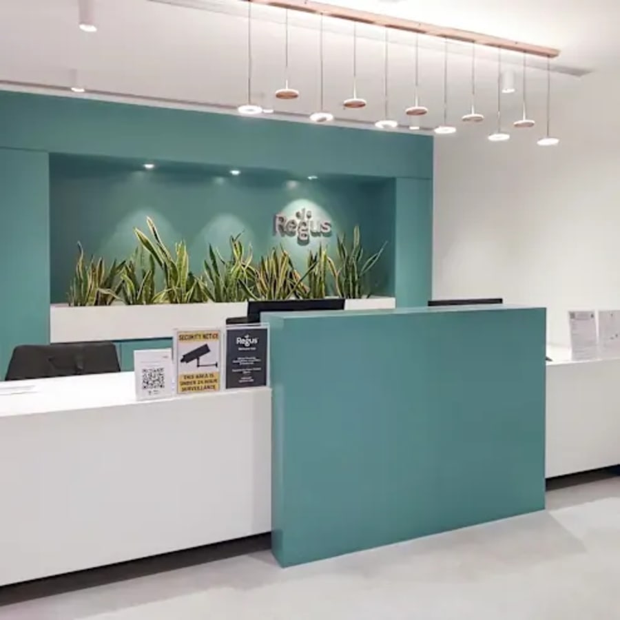 Modern coworking space in Powai with sleek design and ample reception area.