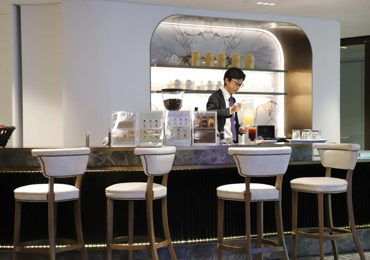 Stylish coffee bar in a vibrant coworking space on Church Street, Singapore. Ideal for networking and relaxation.