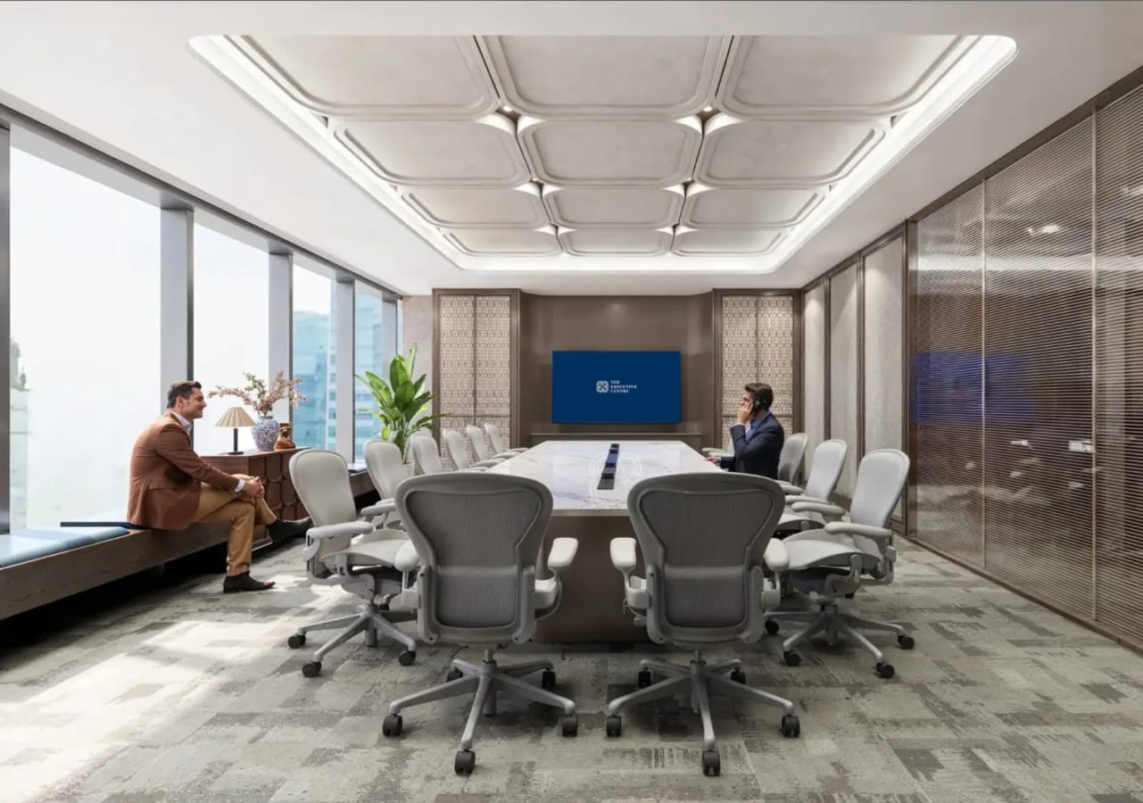 Sleek meeting room with natural light, modern seating, and advanced connectivity in Central Boulevard.