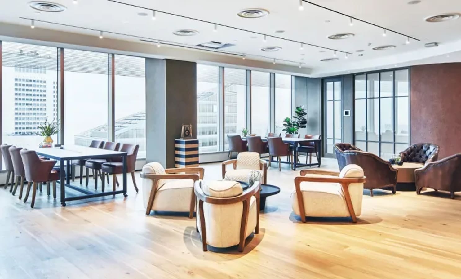 Bright coworking space with modern furniture and city views in Marina Boulevard. Ideal for collaboration.