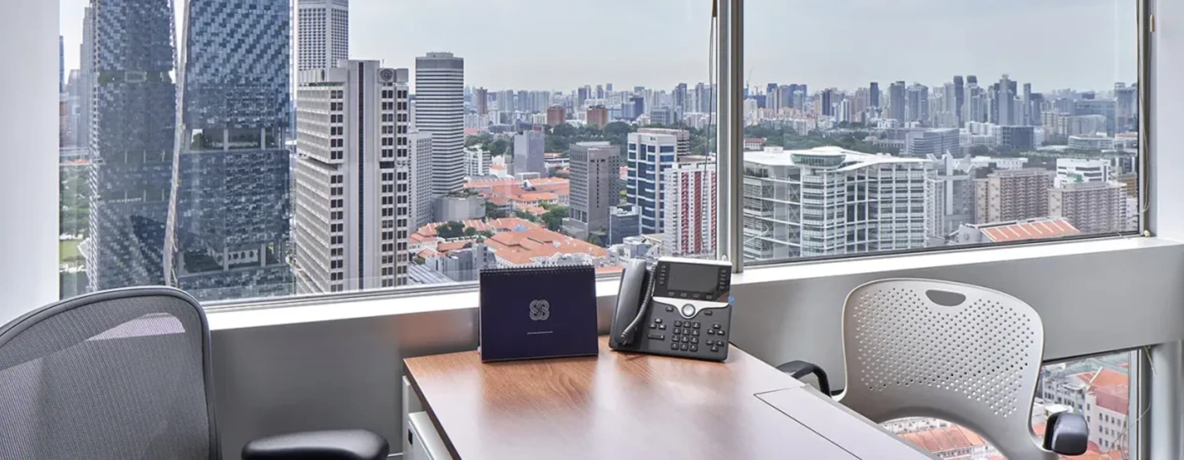 Bright, professional workspace with stunning city views in Gateway West, Singapore.