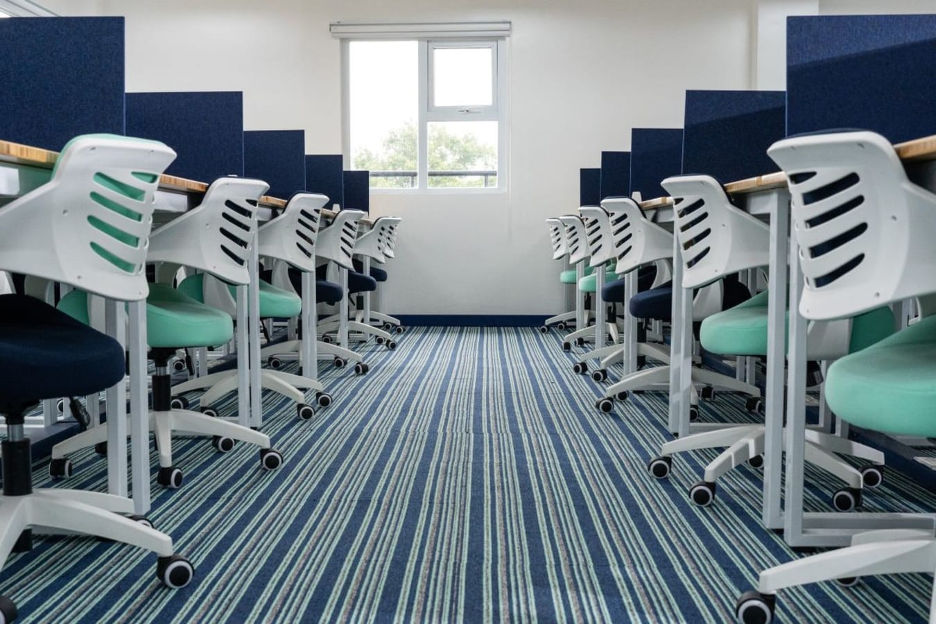 Modern coworking space with ergonomic chairs and ample desk space in Central Luzon.