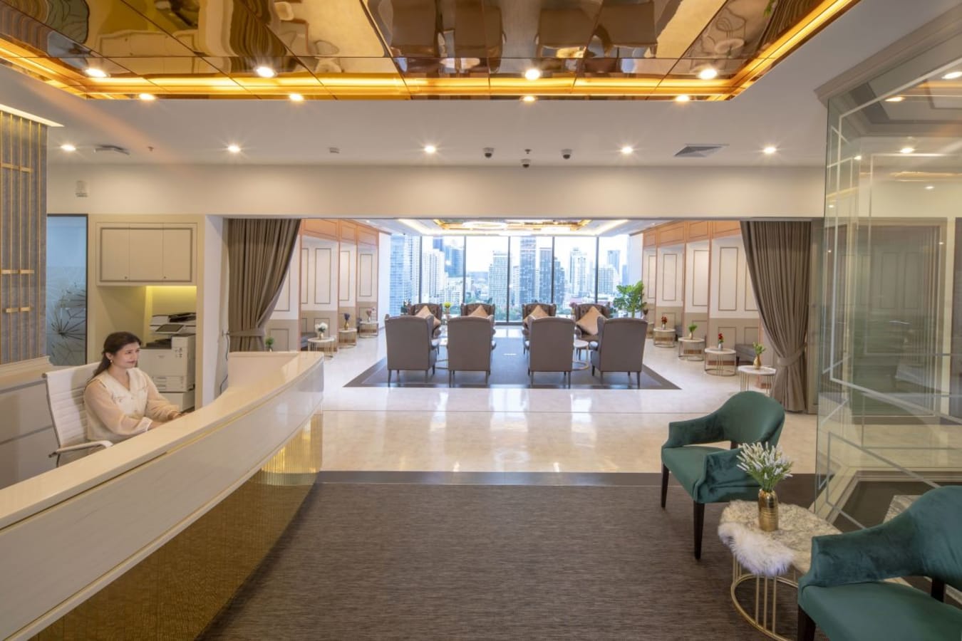 Elegant coworking space with a welcoming reception and city views. Ideal for productivity.