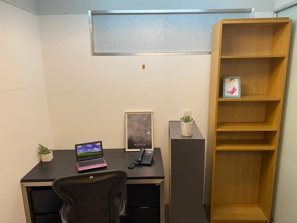 Compact workspace with modern desk, ergonomic chair, and ample shelving in Hysan Avenue.