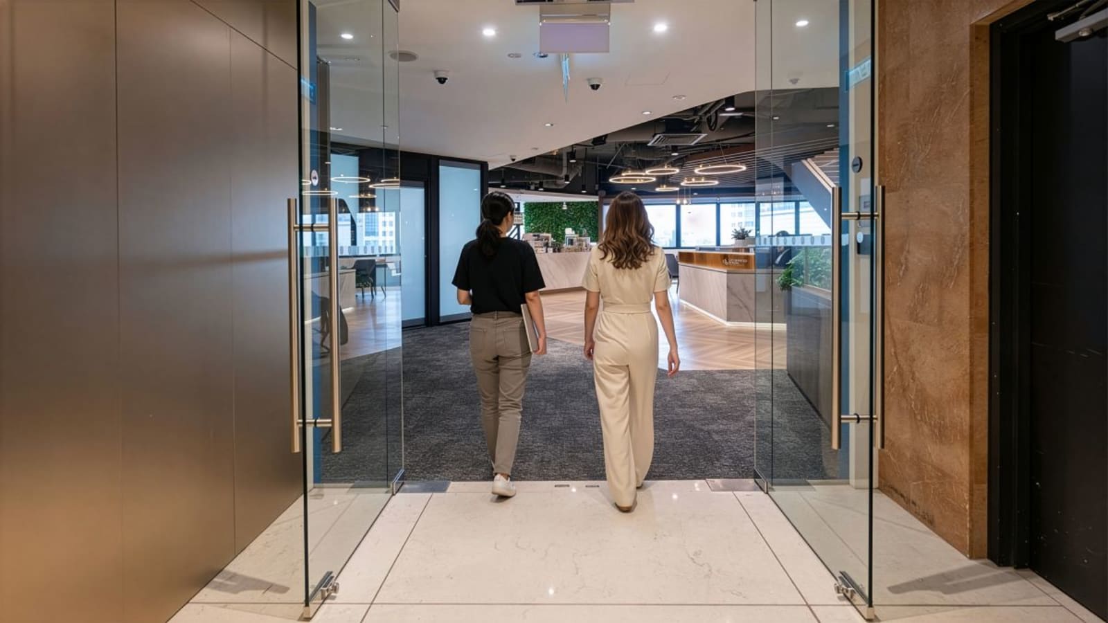 Stylish coworking space in Raffles Place with modern design and ample natural light.